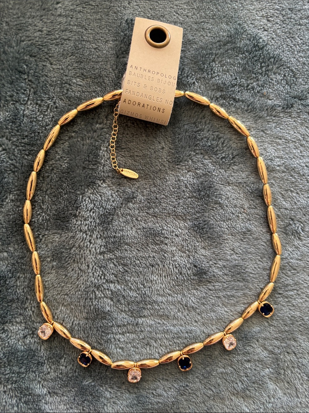 Anthropologie Gold Necklace with Blue and Clear Stone Drops